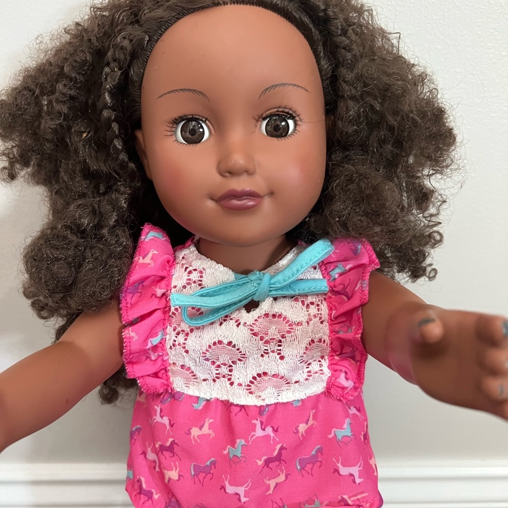18 inch doll and clothes.